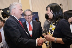 Guest Robert Mason greeting NFCR’s Franklin Salisbury and Dr. Sujuan Ba