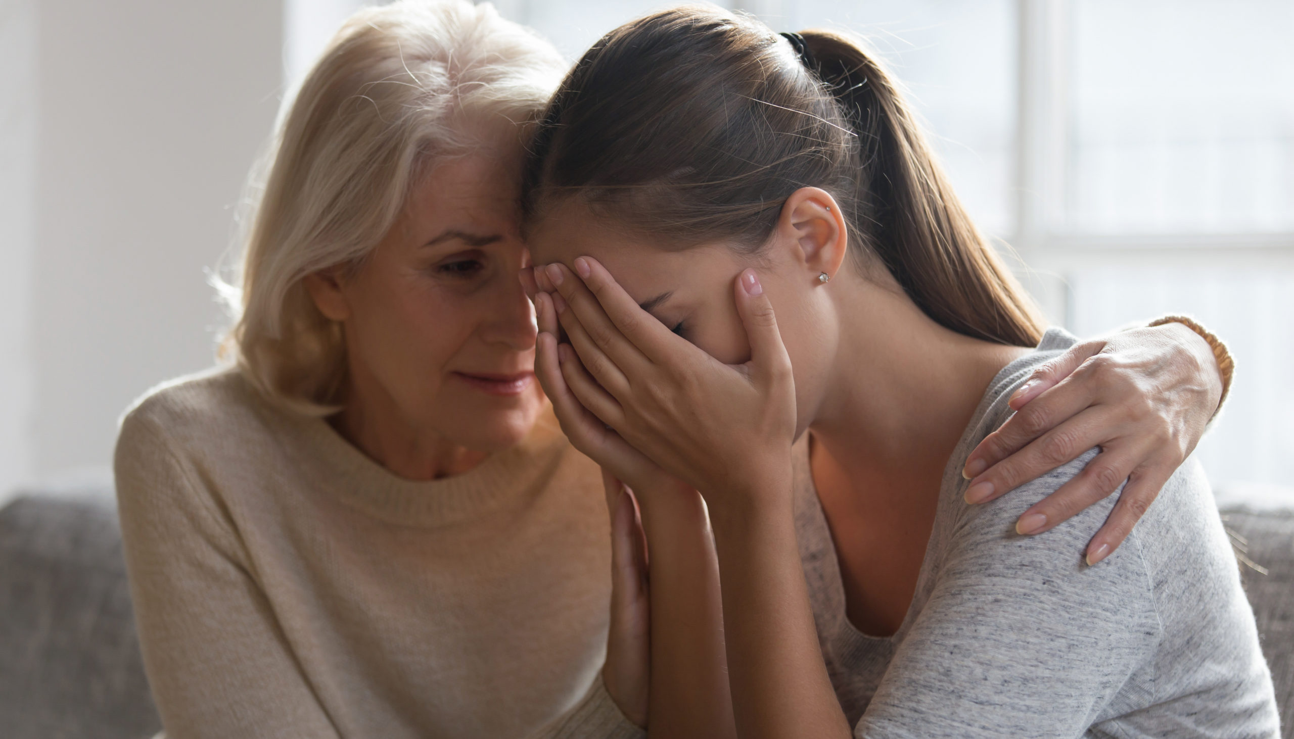 Worried,Aged,Mother,Embracing,Comforting,Grown,Up,Daughter,With,Broken