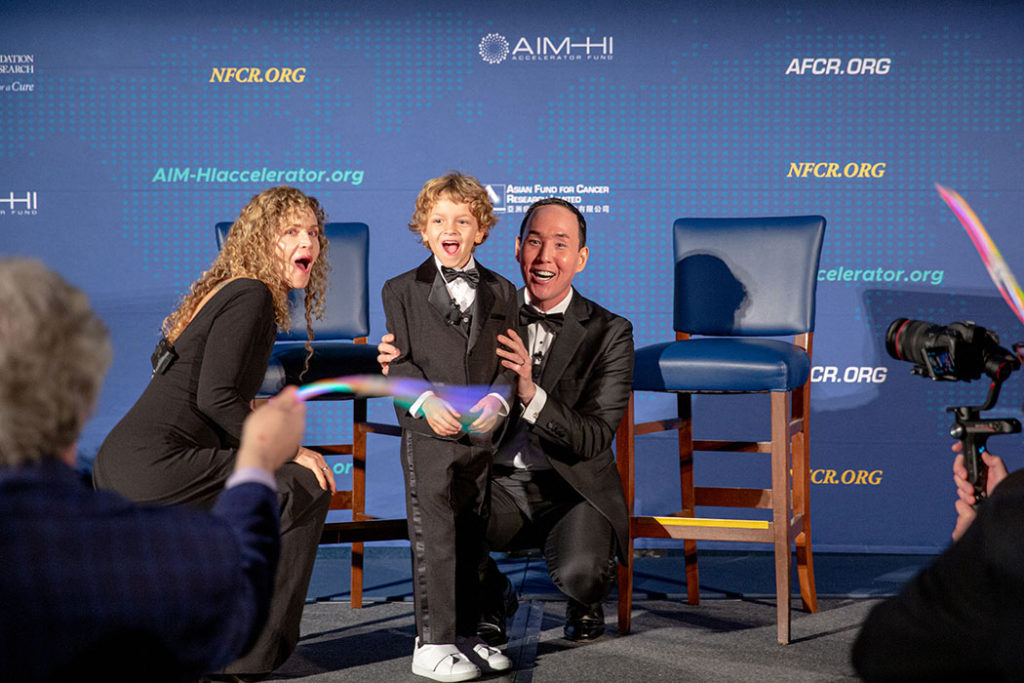 GirardIm_NFCR2022-1472 small Katie and Greyson Banovich with Lance Kawaguchi